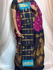 Madurai Sungudi Cotton Saree featuring a body Garjola Kattam, complemented by a matching Constrast-colored running blouse and a traditional Grand zari border.