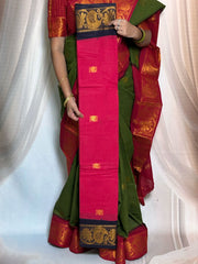 Madurai Sungudi Cotton Saree featuring a Poonam body Butta, complemented by a matching Constrast-colored Seperate blouse and a Constrast zari border