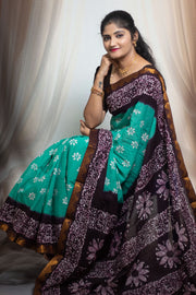 Traditional Madurai Sungudi Cotton Saree featuring Wax Print design and Vesti-style Border, paired with a matching blouse.