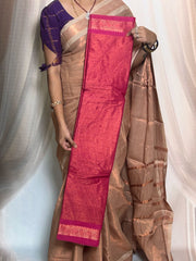 Madurai Sungudi Cotton Saree featuring a body tissue design, complemented by a matching self-colored running blouse and a traditional zari border.