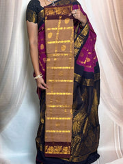 Madurai Sungudi Cotton Saree featuring a body Garjola Kattam, complemented by a matching Constrast-colored running blouse and a traditional Grand zari border.