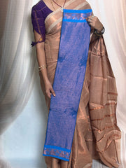 Madurai Sungudi Cotton Saree featuring a body tissue design, complemented by a matching self-colored running blouse and a traditional zari border.