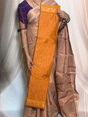 Madurai Sungudi Cotton Saree featuring a body tissue design, complemented by a matching self-colored running blouse and a traditional zari border.